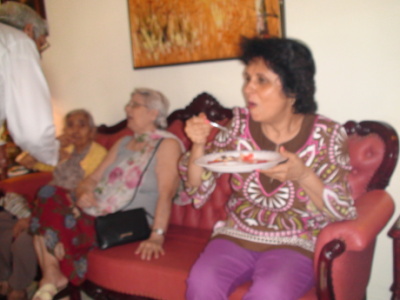 Farida with a plate - one more time caught in action! Ha Ha Ha!