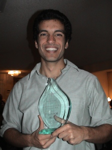 Mr. Farrokh Irani, 2006 FEZANA Scholar, with his plaque